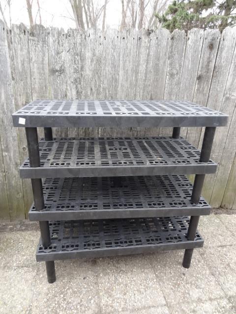 lot 61 image: Plastic risers. 4 total. Stack toge...