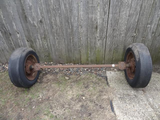 lot 62 image: Steel trailer axle. 48&quot spring...