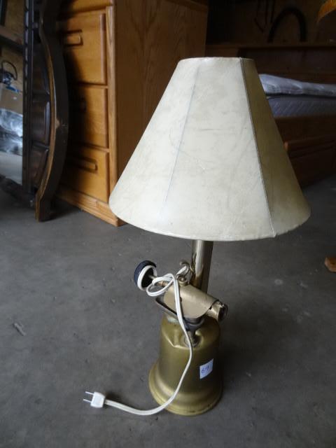 lot 69 image: Brass blow torch table lamp...