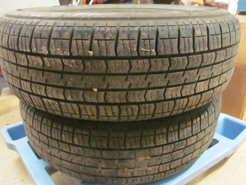 lot 21 image: Pair of Tires - 21570R15, About 4...