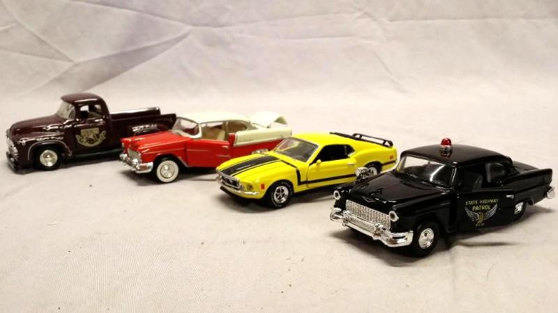 4 Die cast cars,doors and trunks op...
