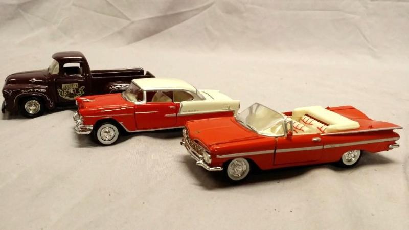 3 Die cast cars including 55 Chevy...