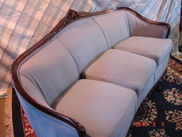 This vintage couch is a kind of blu...
