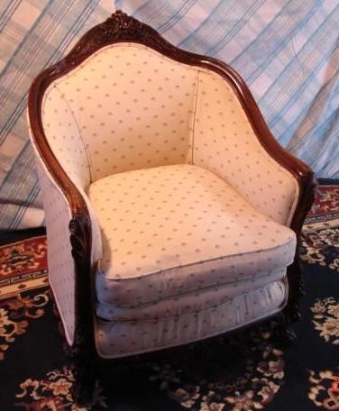 This vintage chair matches the couc...