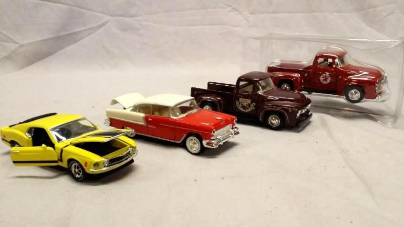 4 Die cast cars,doors and trunks op...