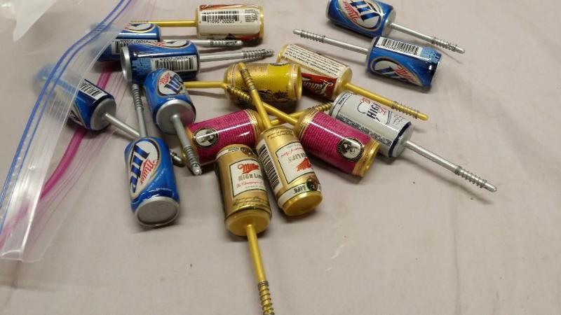 15 Fishing bobbers of different bee...