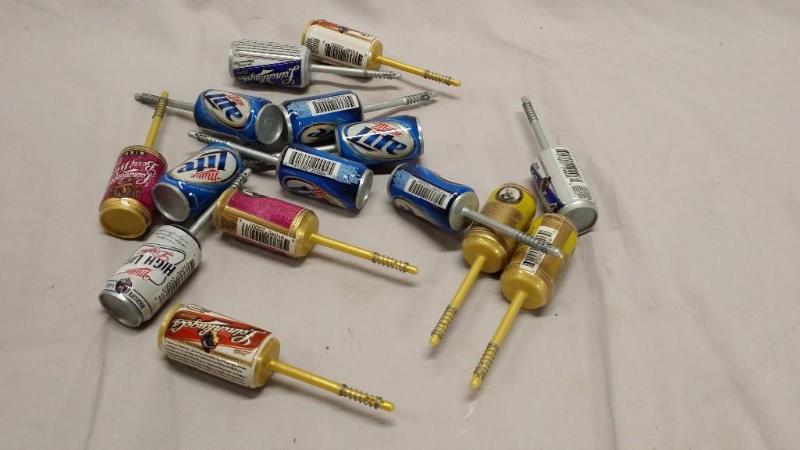 15 Fishing bobbers of different bee...
