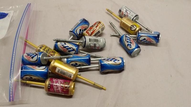 15 Fishing bobbers of different bee...