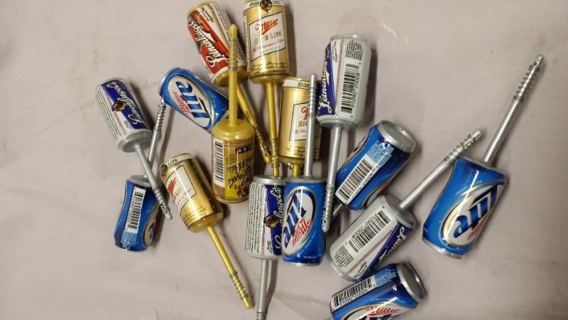 15 Fishing bobbers of different bee...