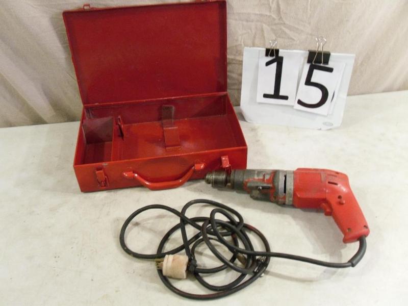 lot 15 image: Corded Hammer Drill with Metal Cas...