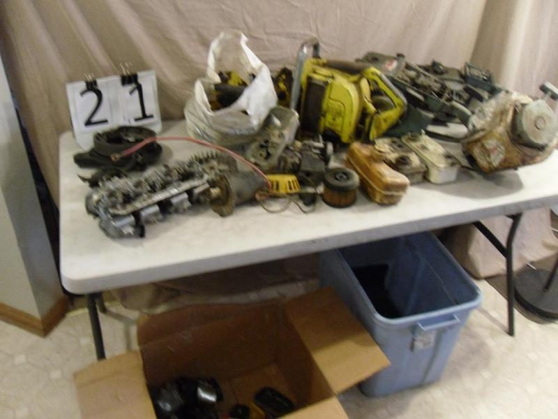lot 21 image: Chainsaw Motors for parts or repair...