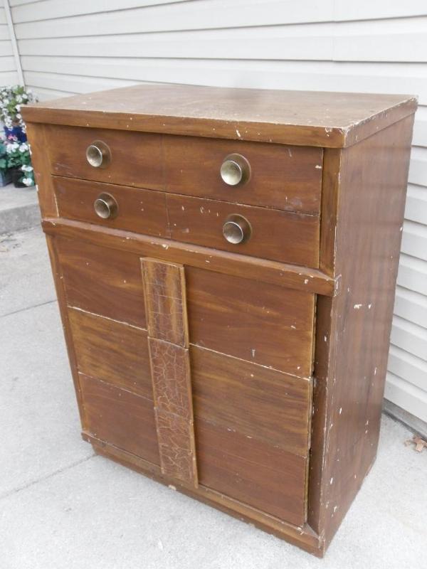 lot 143 image: Wood 5 Dresser. Measures 34.25"...