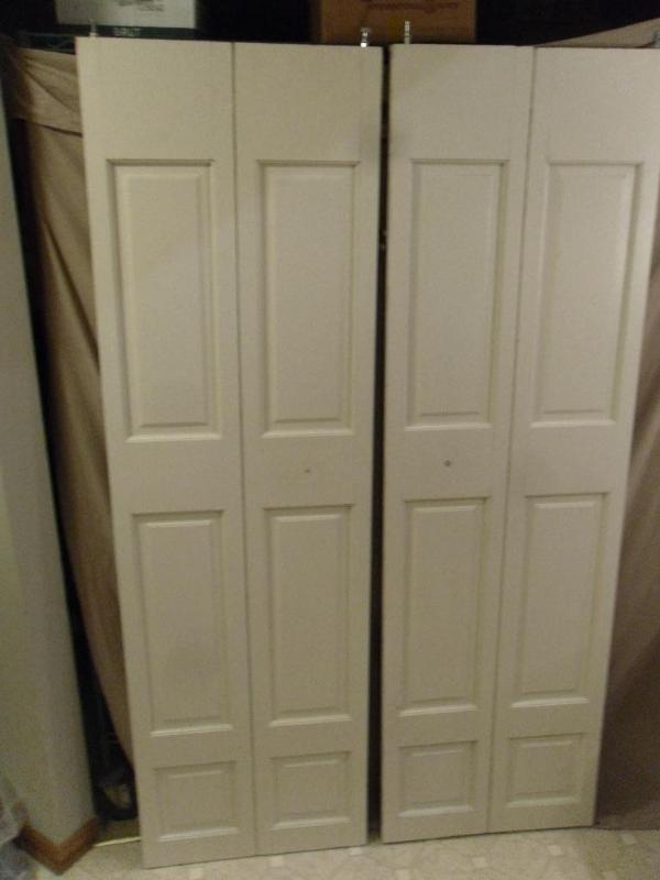 lot 157 image: 2 Large Solid Wood Bi Fold Doors. E...