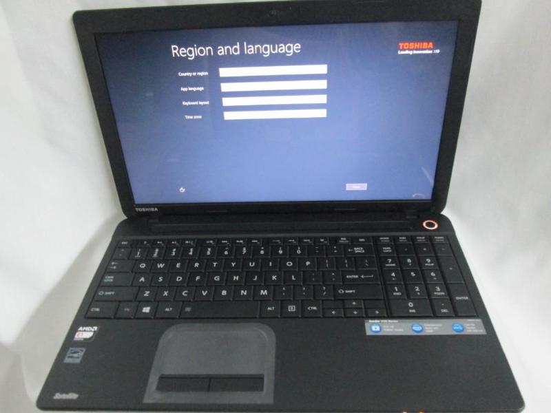 lot 1 image: Toshiba Satellite 15.6 4GB Laptop