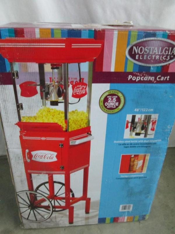 lot 7 image: Nostalgia Electrics 10 Cup  Coke Popcorn Cart