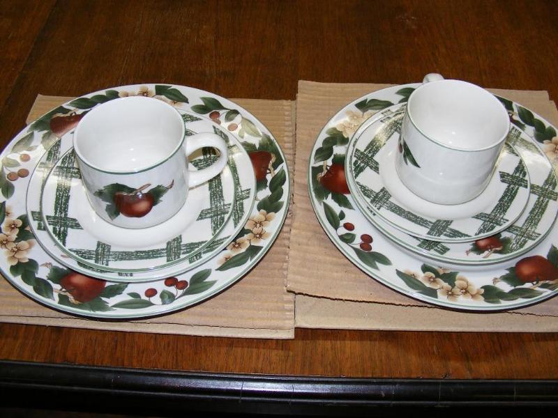 lot 512 image: 2 place settings, Apple Dishes. The...