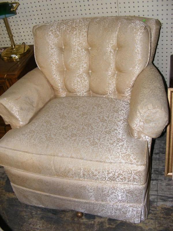 lot 521 image: Swivel Rocking Chair, cream and gol...
