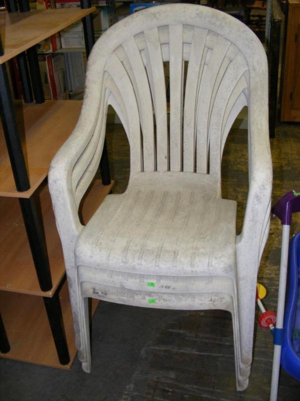 lot 556 image: 3 White Plastic Lawn Chairs, need t...