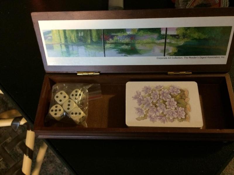 deck of cards and dice in a very ni...
