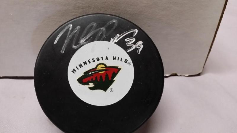 lot 35 image: Minnesota Wild signed Hockey puck o...