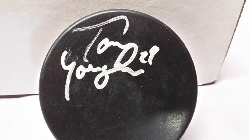 lot 36 image: Signed Hockey puck of #29 Tom Young...