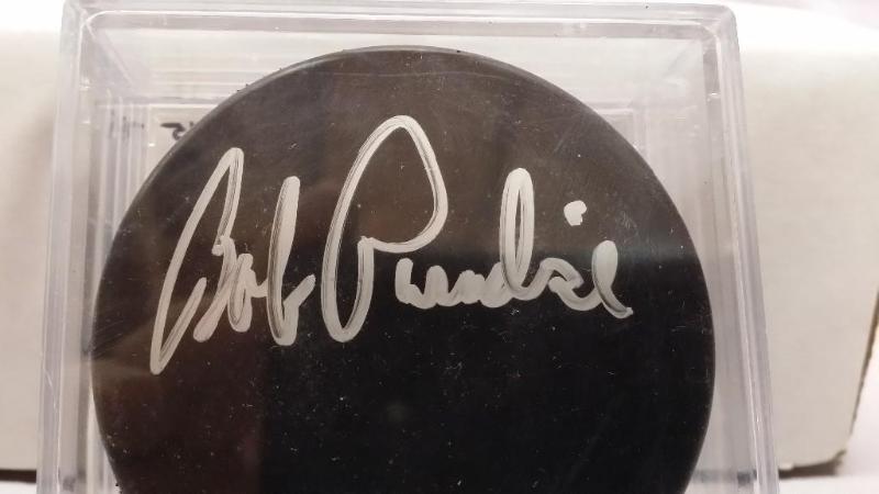 lot 45 image: Signed Bob Paradise &nbspHockey pu...