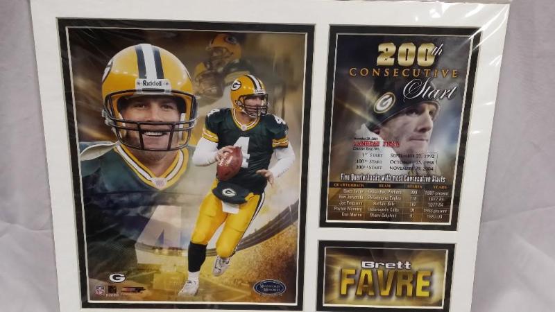 lot 53 image: Brett Farve #4 of the Green Bay Pac...