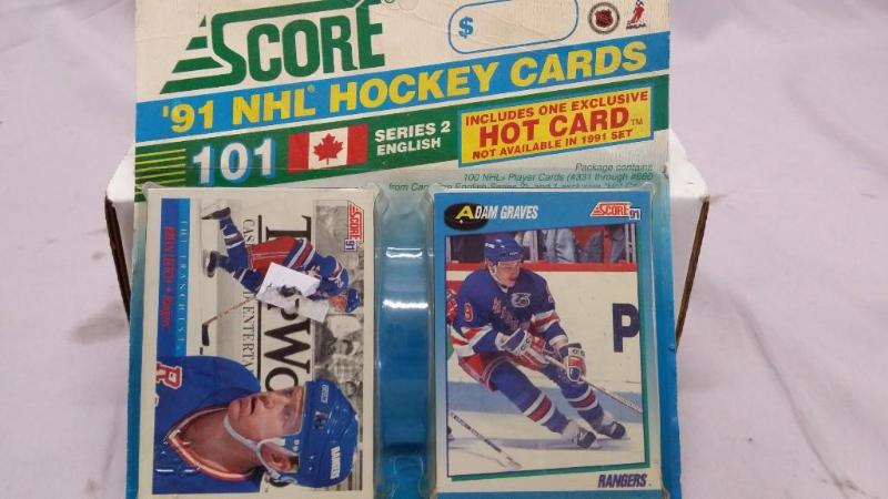 lot 66 image: 1991 Score NHL Hockey cards. New in...