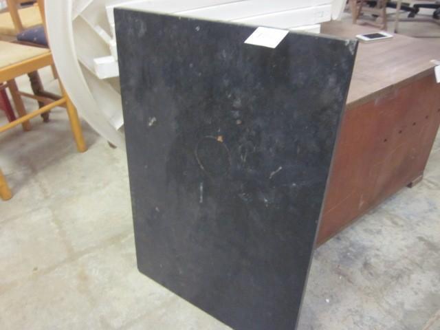 19 in. x 28 in. black granite slab....