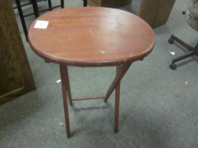 Oval fold up wood table....