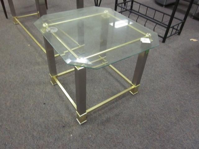 Brass and glass side table, matches...