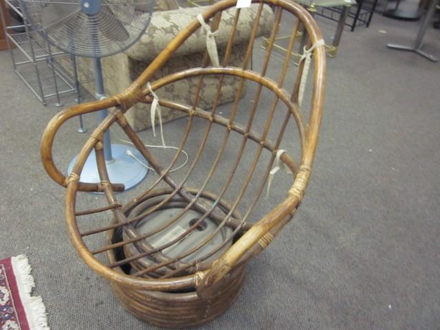 Rattan swivel chair, just needs cus...