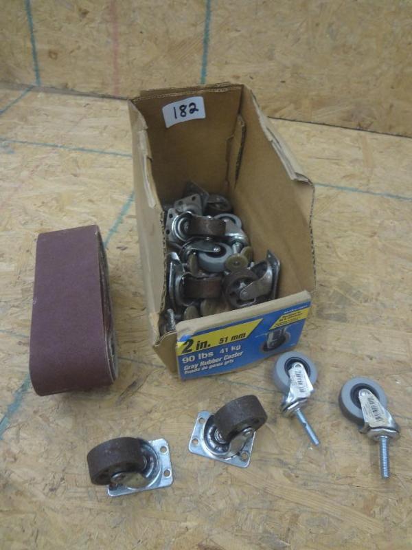 lot 182 image: Box Of New Caster Wheels & Belt...