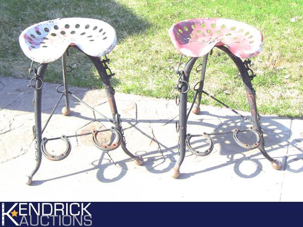 lot 25 image: 2 Folk Art Tractor Seat Stools