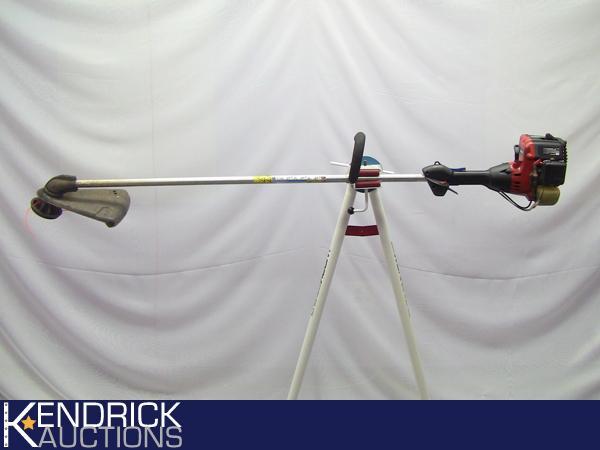lot 65 image: Homelite Gas Powered Weed Whip