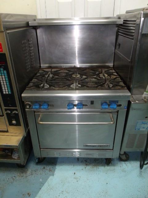 lot 2 image: G26-6, 34 GRIZZLY GAS MEDIUM DUTY 6 BURNER GAS RANGE W OVEN