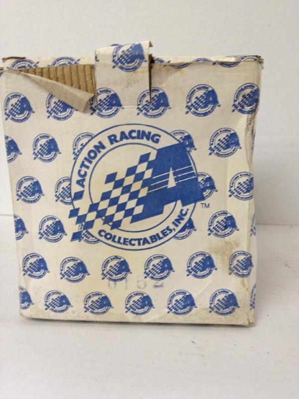 lot 44 image: Jeff Gordon Action Racing Dupont Paint Can with Car Inside