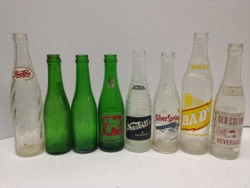 lot 65 image: 8 Asorted Vintage Soda Bottles