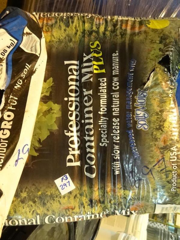 lot 297 image: Approx 50 lbs potting soil...