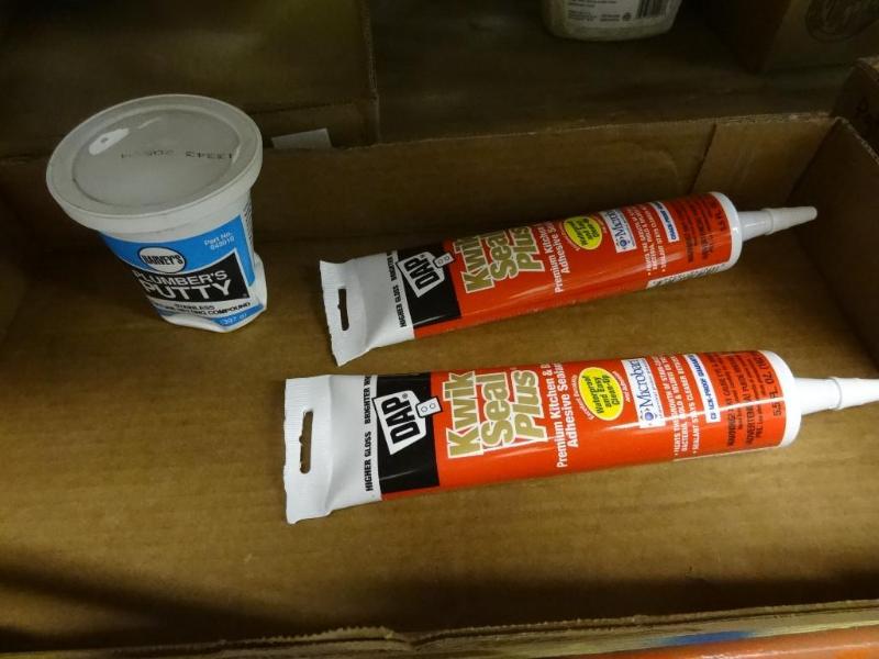 lot 57 image: New plumbers putty and qty 2 DAP kw...