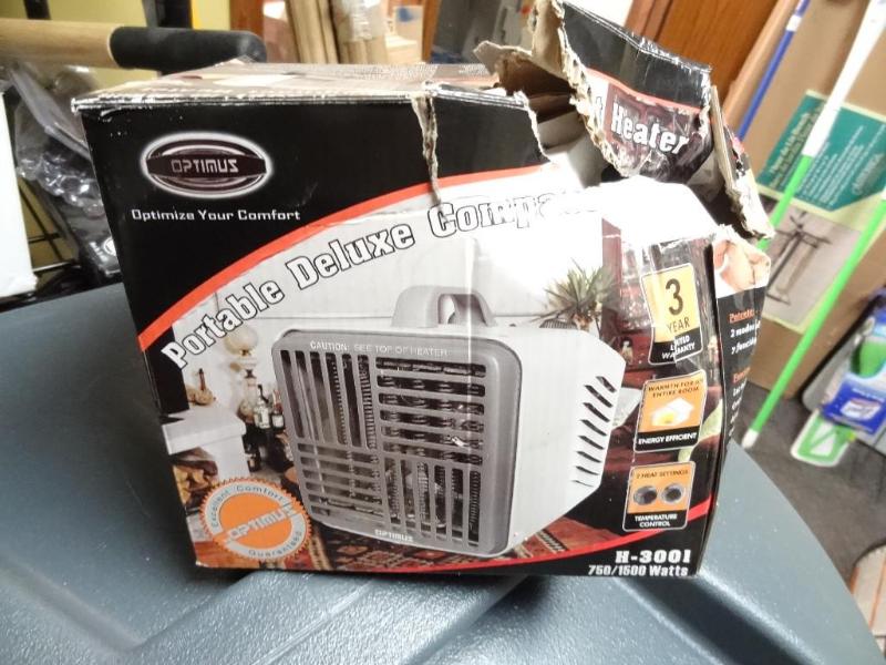 lot 96 image: New Optimus 1500 watt ceramic heate...