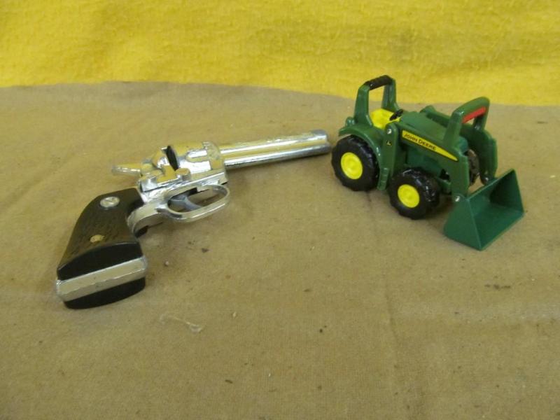 lot 214 image: Stallion Cap Gun and Small John Dee...