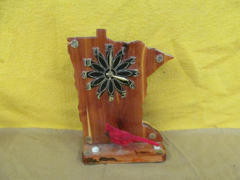 lot 64 image: Wood Minnesota Shaped Clock, 13 in ...