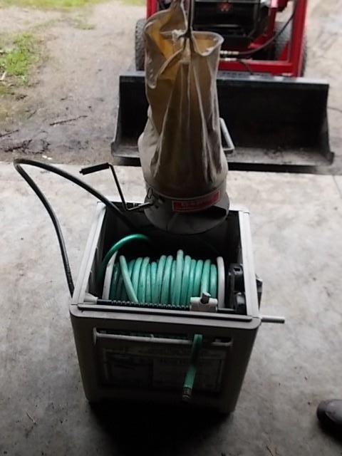 lot 65 image: Garden Hose, Hose Reel, Seeder...