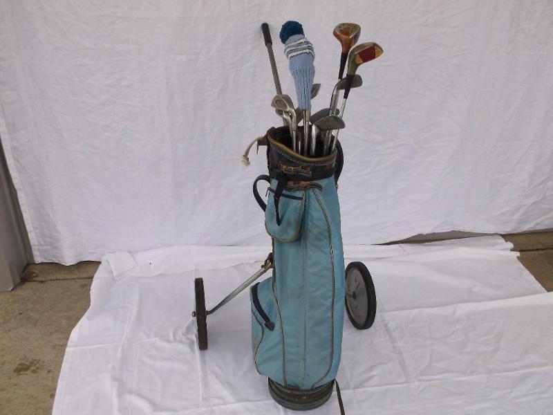 Nice set of golf clubs in bag with ...