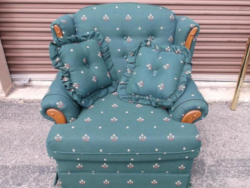 Nice green chair with two pillows i...
