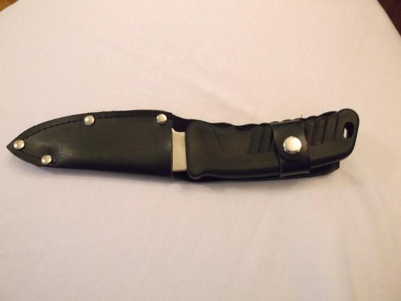 Knife in leather like sheath 1 12&...