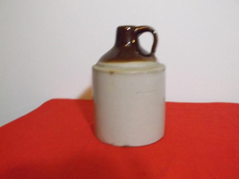 Shoulder jug very cute has one chip...