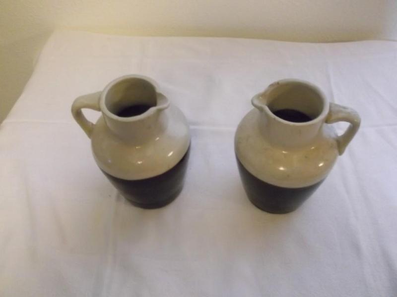 2 Very cute ceramic pitchers one ha...