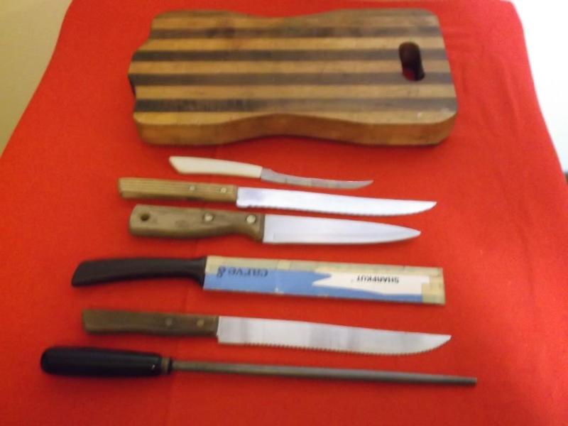 Solid wood cutting board with 5 kni...
